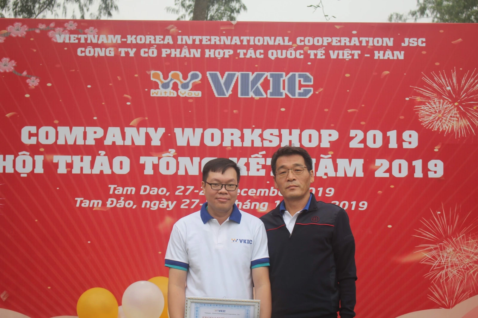 Two team members at the company’s 2019 year-end workshop